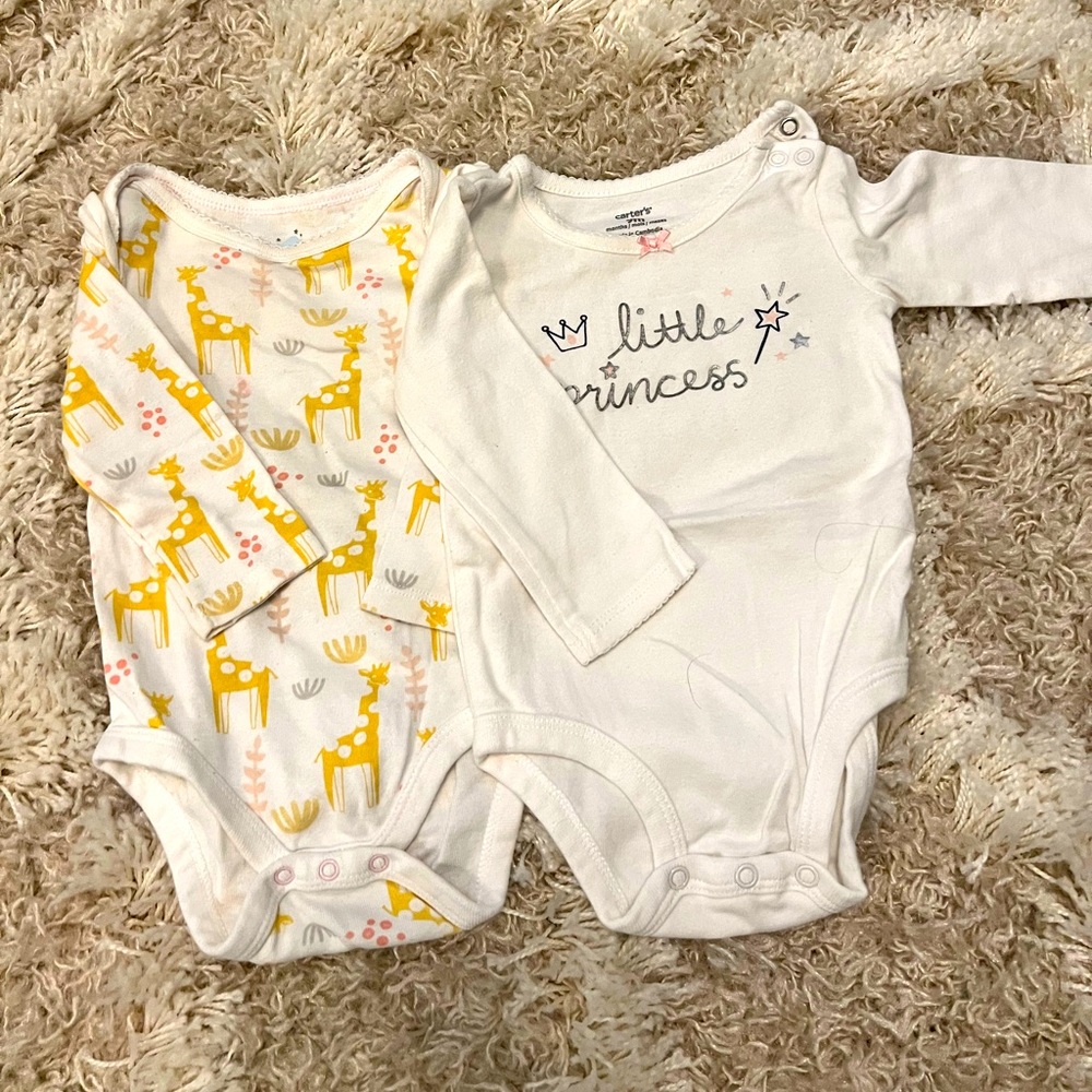 Pair of long sleeved onesies.